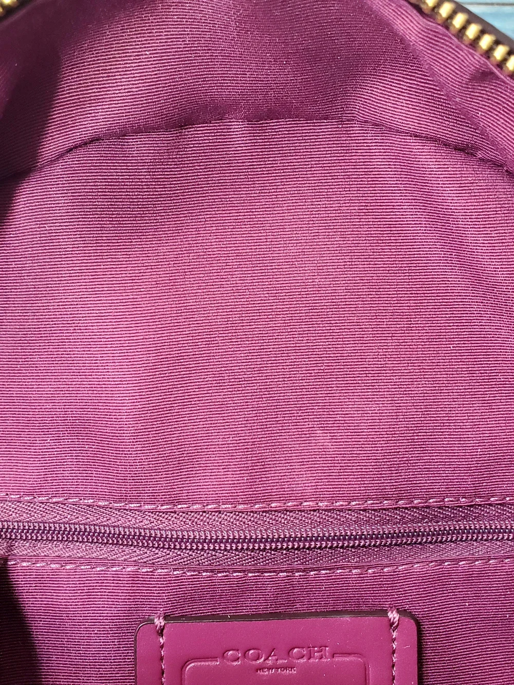 COACH JORDYN BACKPACK IN SIGNATURE CANVAS METALLIC BERRY/BROWN